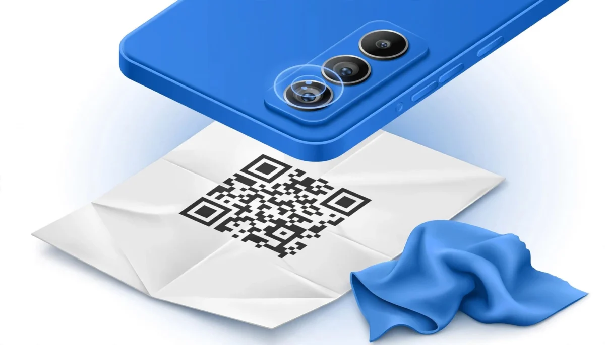 Κινητό στραμμένο σε τσαλακωμένο QR με πανί καθαρισμού δίπλα.